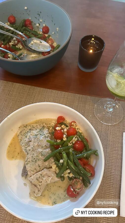 A plated dinner with green beans and tomatoes