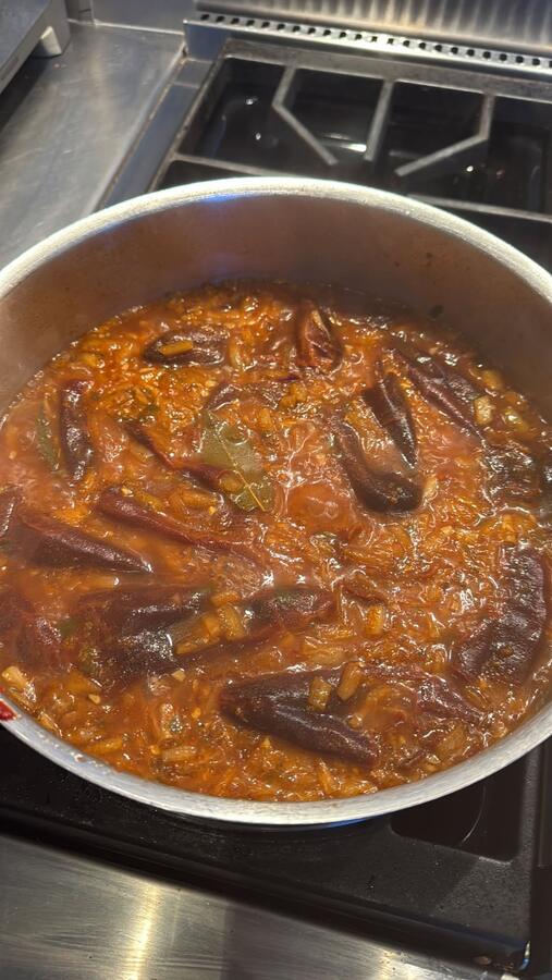 A pan of eggplant stew on the stove