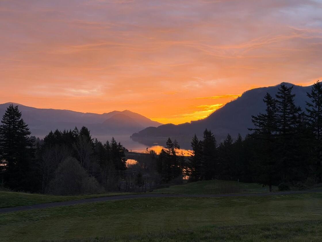 A mountain valley at sunset