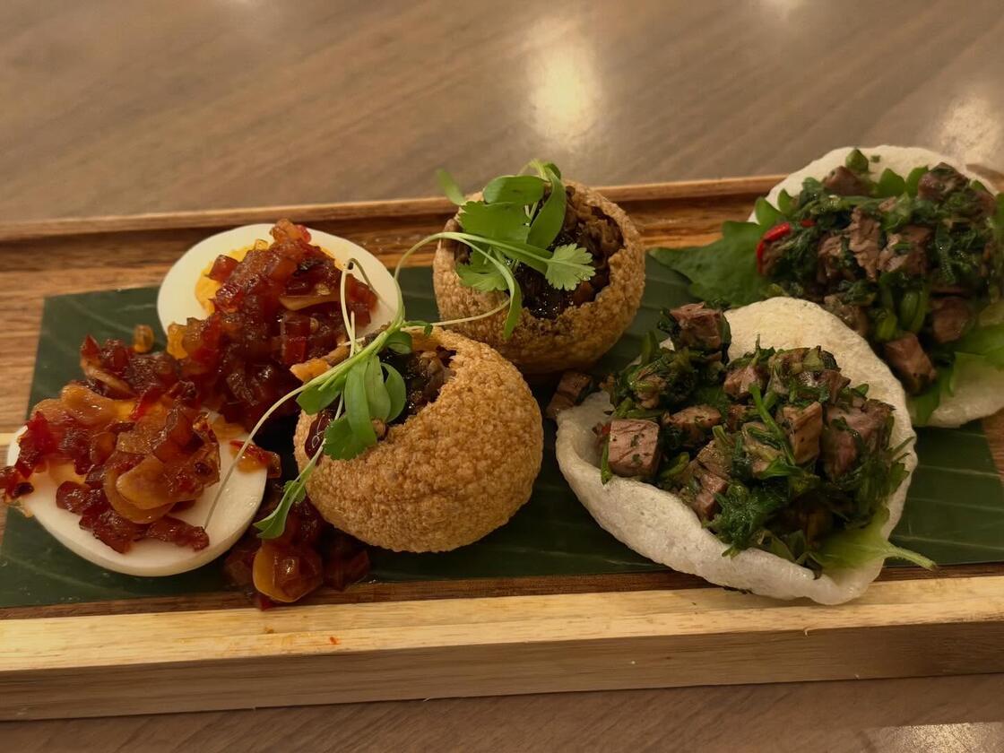 Street food served on a banana leaf