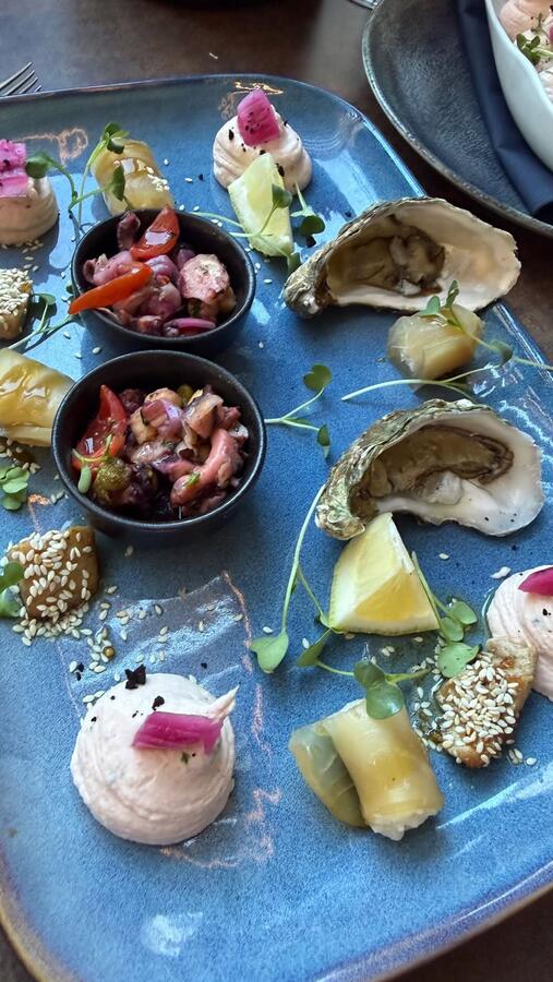 A spread of seafood and oysters